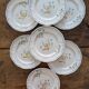 7 hand-painted earthenware dessert plates – France, 1950s