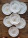 7 hand-painted earthenware dessert plates – France, 1950s