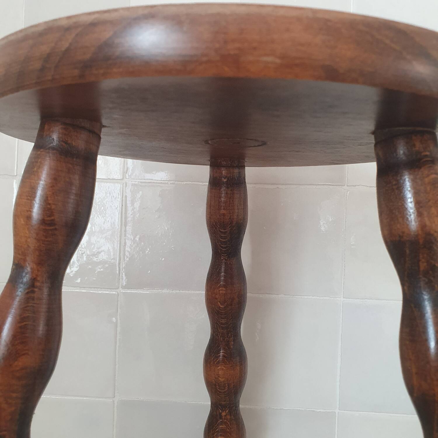 Turned wooden stool / tripod with round seat
