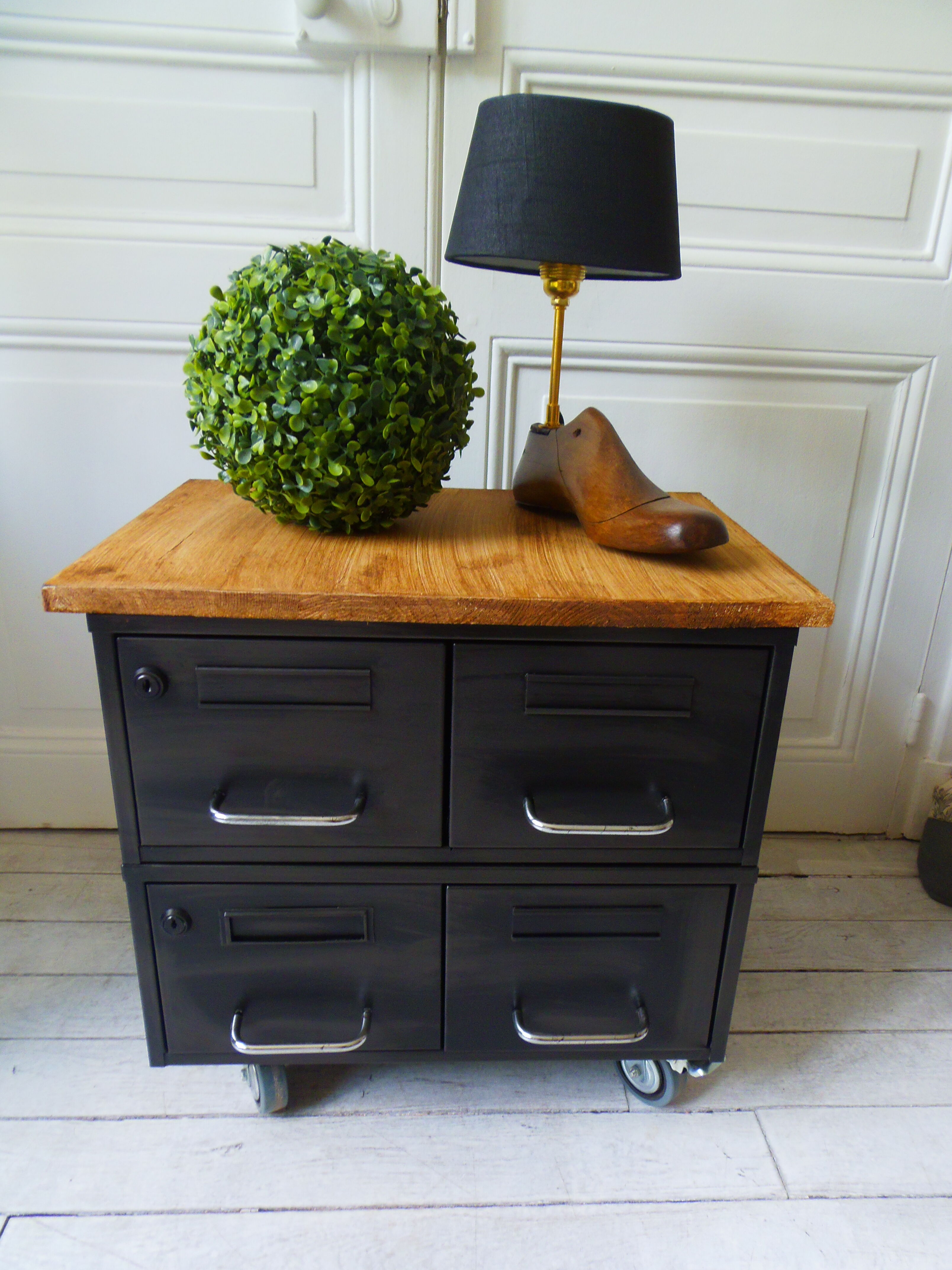 Vintage furniture with metal plugs on black wheels wooden tray
