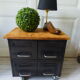 Vintage furniture with metal plugs on black wheels wooden tray