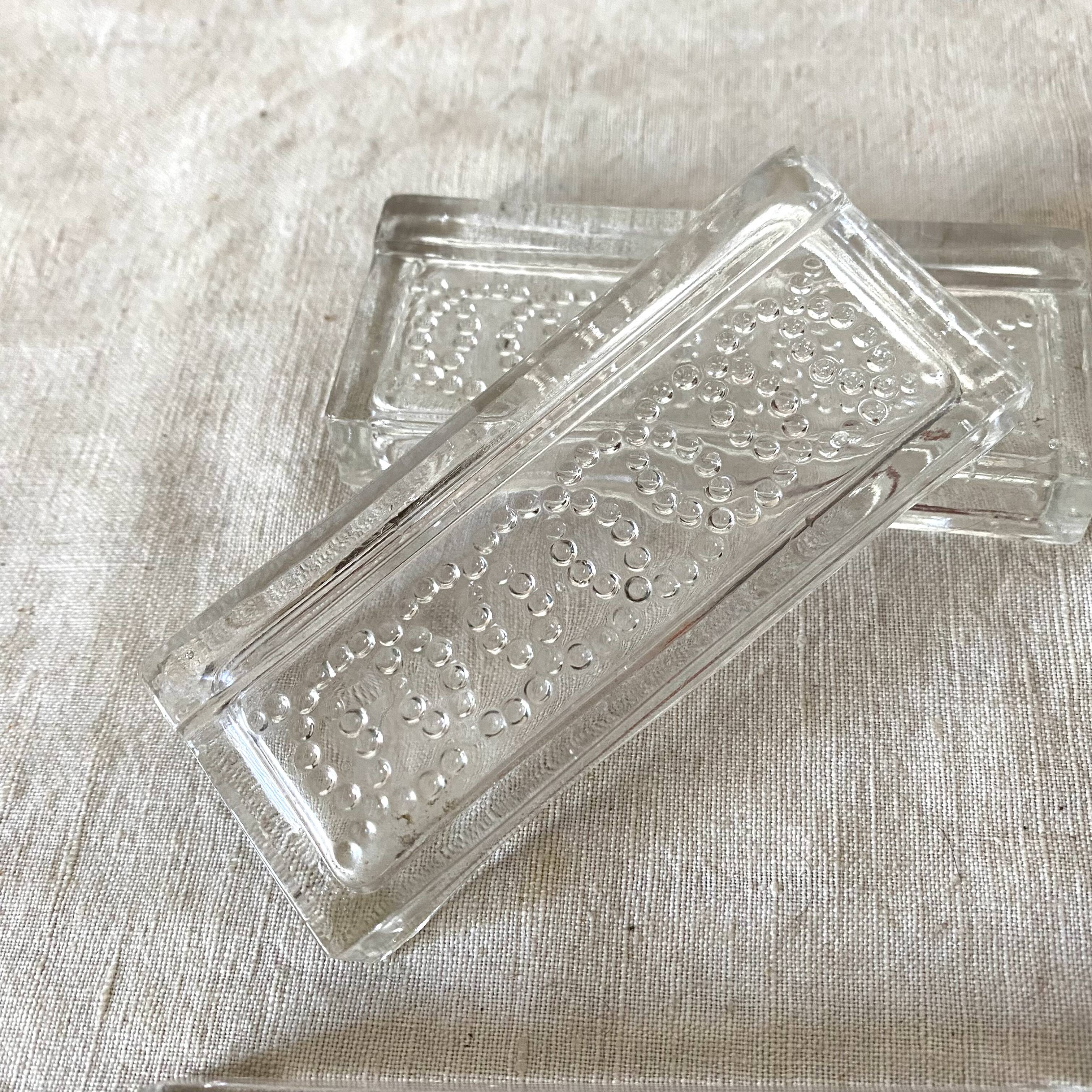 Glass knife holders from the 1950s