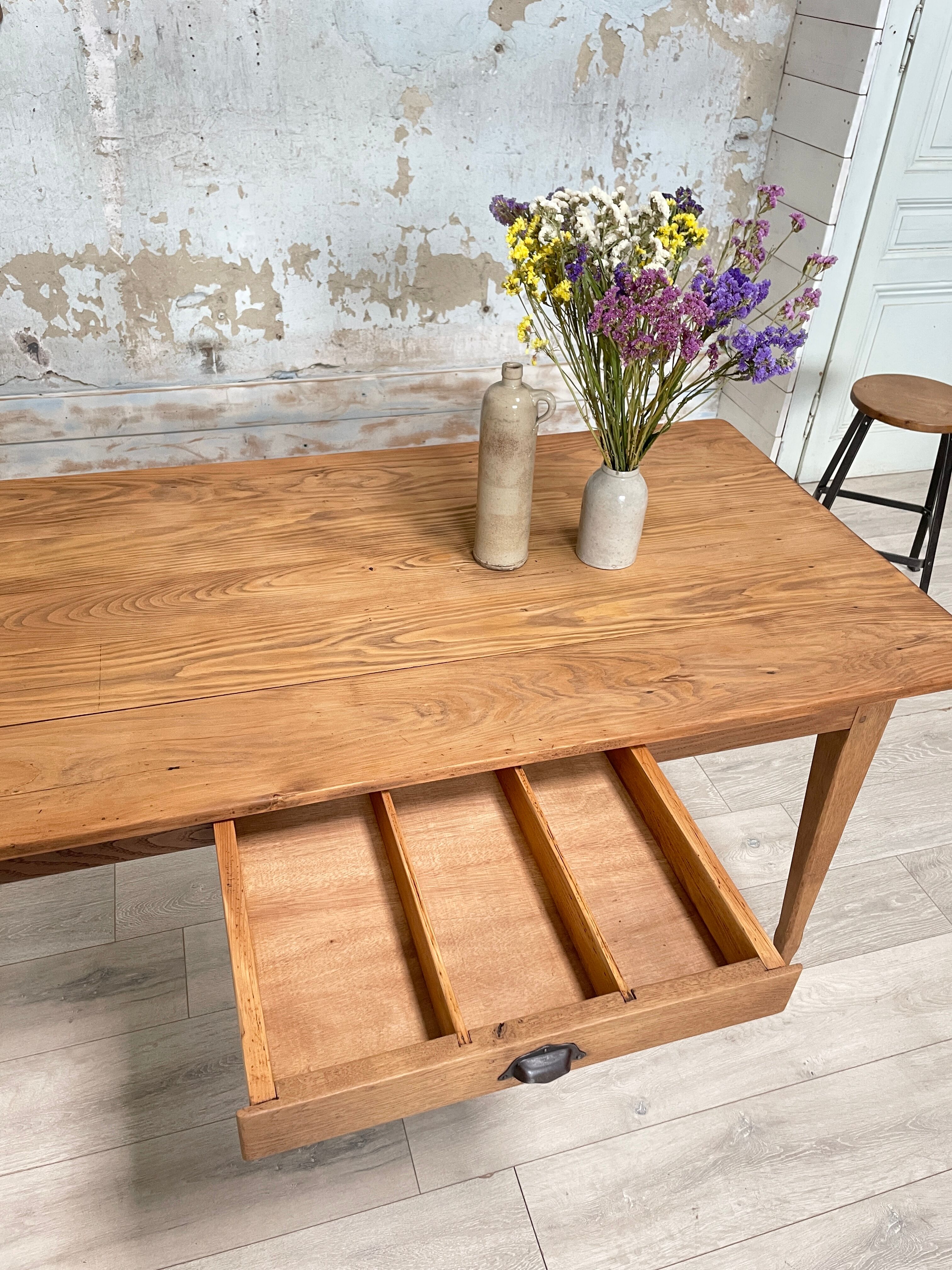 Vintage farmhouse table with spindle legs.