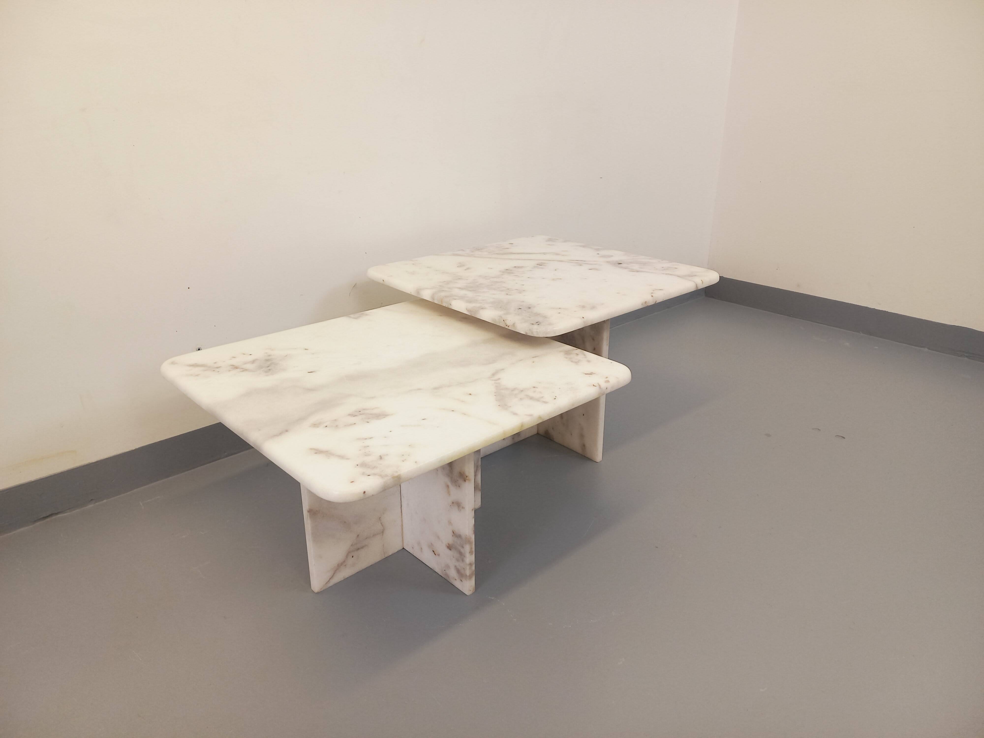 Pair of vintage nesting coffee tables in white marble from the 1970s.