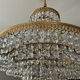 Brass chandelier and crystal tassel waterfall
