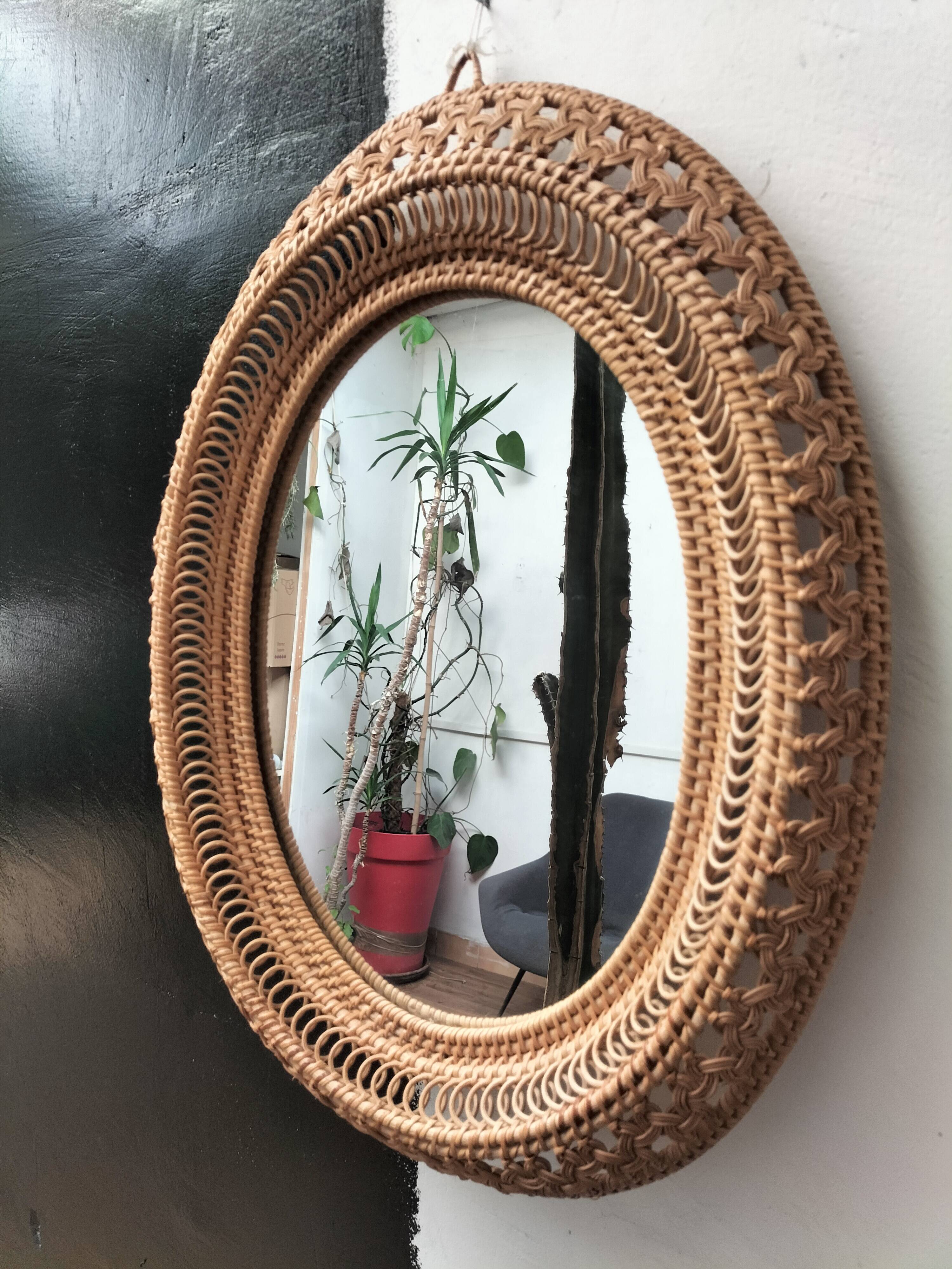 Oval rattan mirror