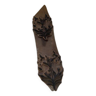 Antique wooden fabric printing stamp with floral pattern