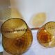 Set of 2 vintage vases in the shape of mustard yellow glasses.