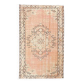 Tapis persan à décor géométrique saumon et pêche