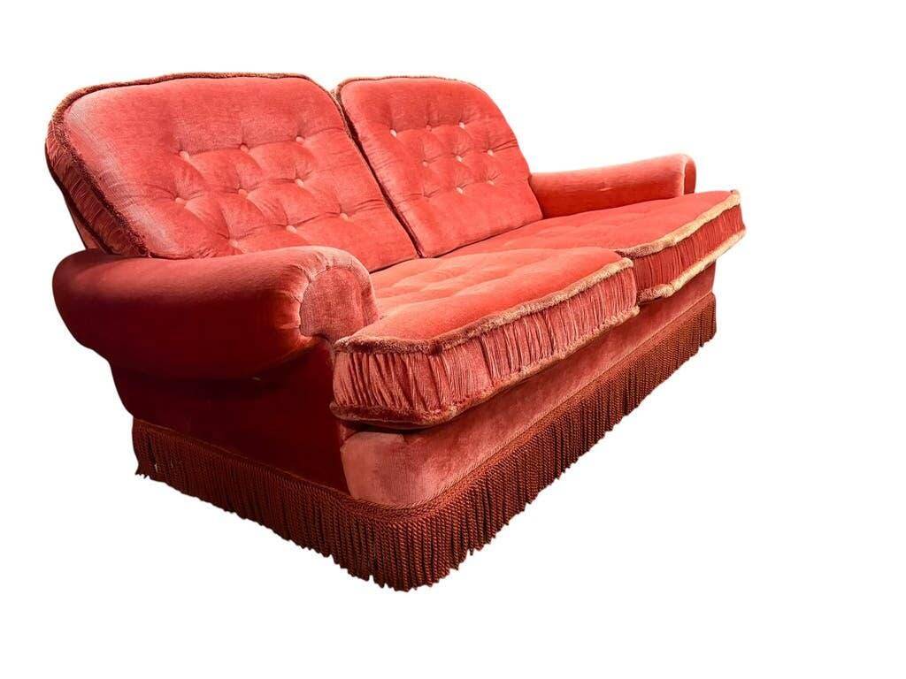 Vintage pink two-seater sofa with fringes