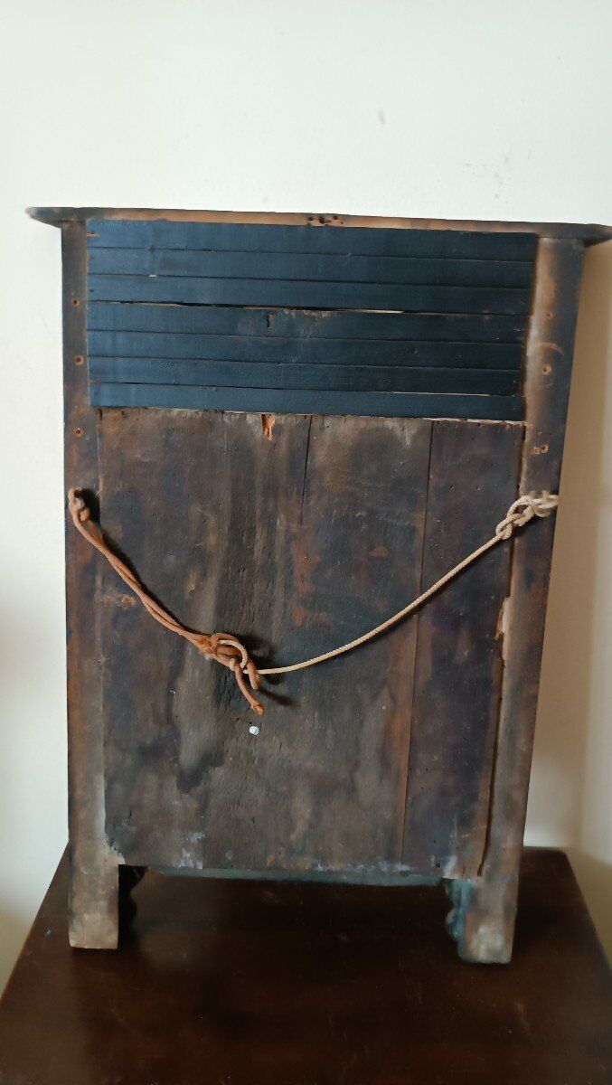 Small antique Empire mirror in gilded wood painted on glass