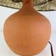 Terracotta globe lamp with a wool shade from the 1960s.