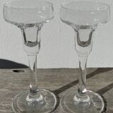 Pair of clear glass candlesticks, signed