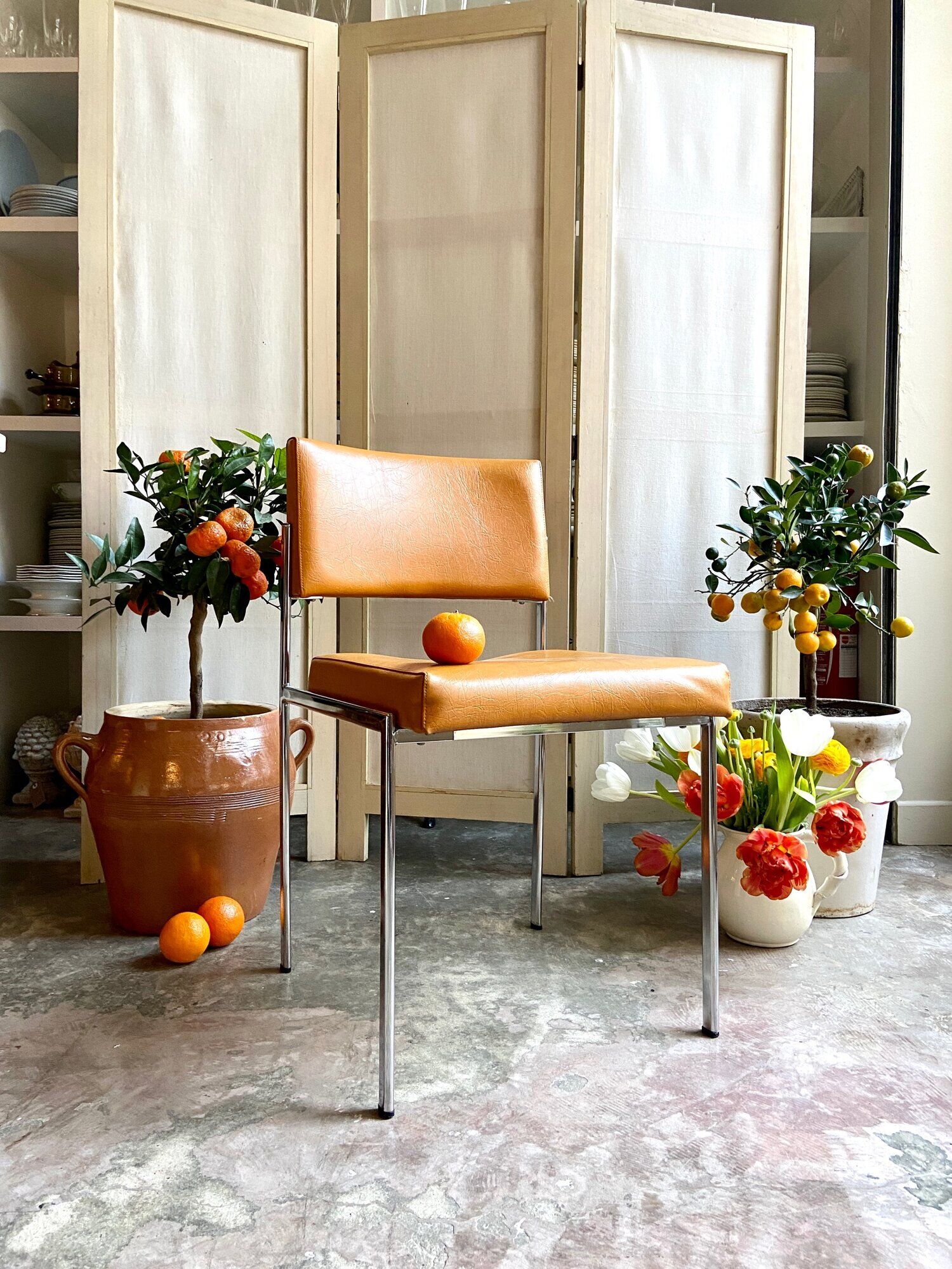 Chair in chromed metal and ochre skaï 1970s