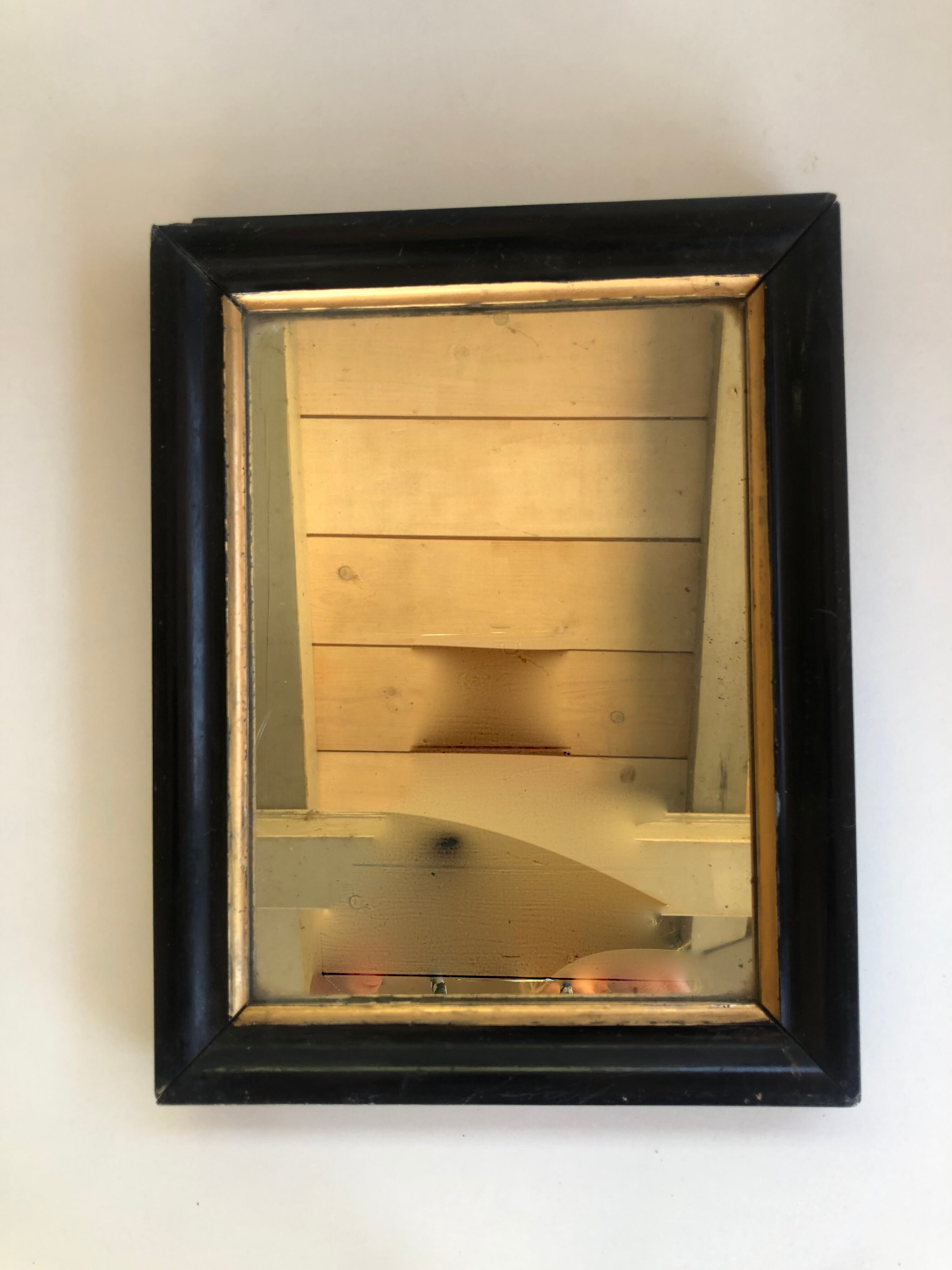 Miroir ancien bois noir et or