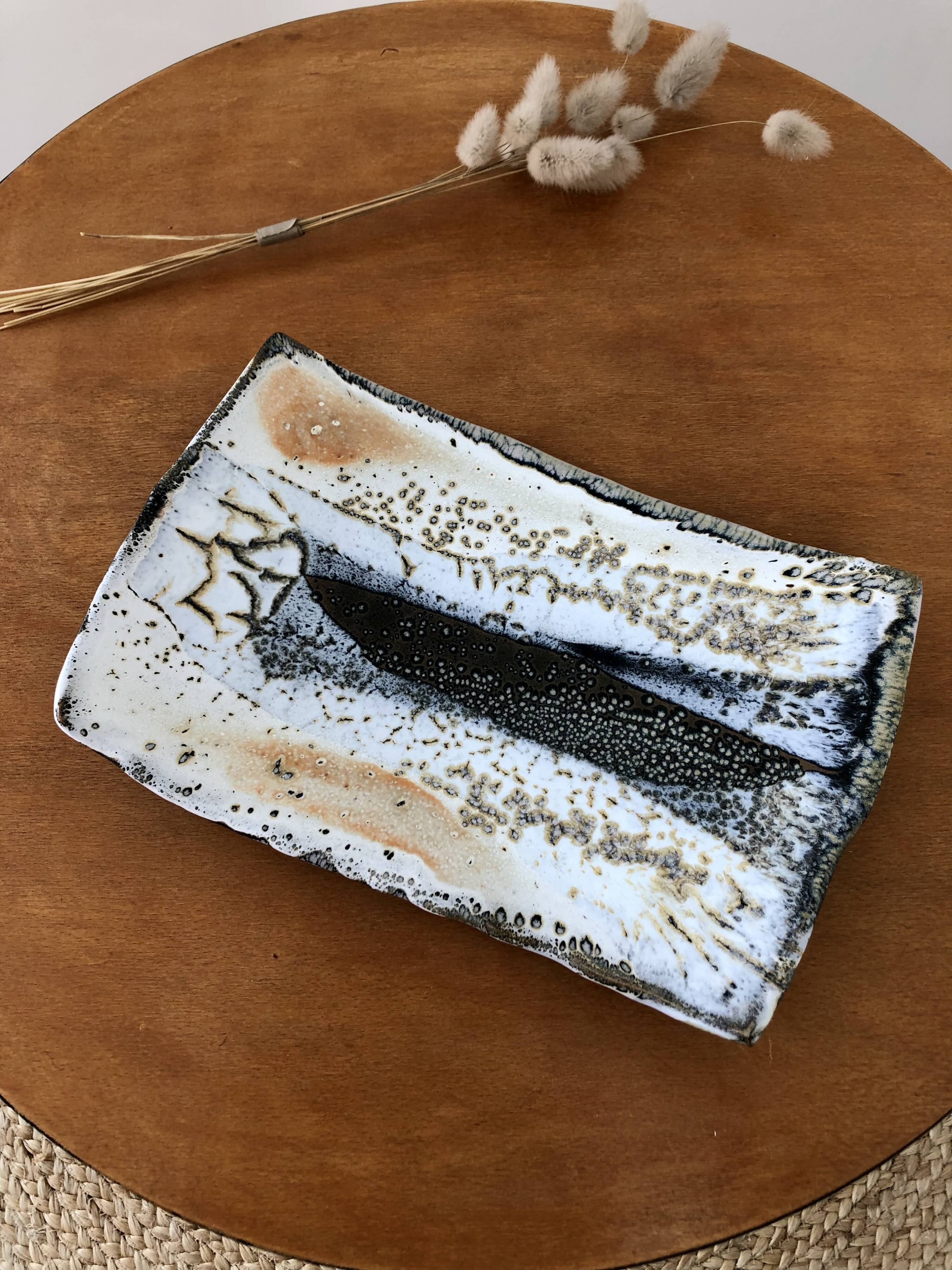 Cup in enamelled sandstone signed