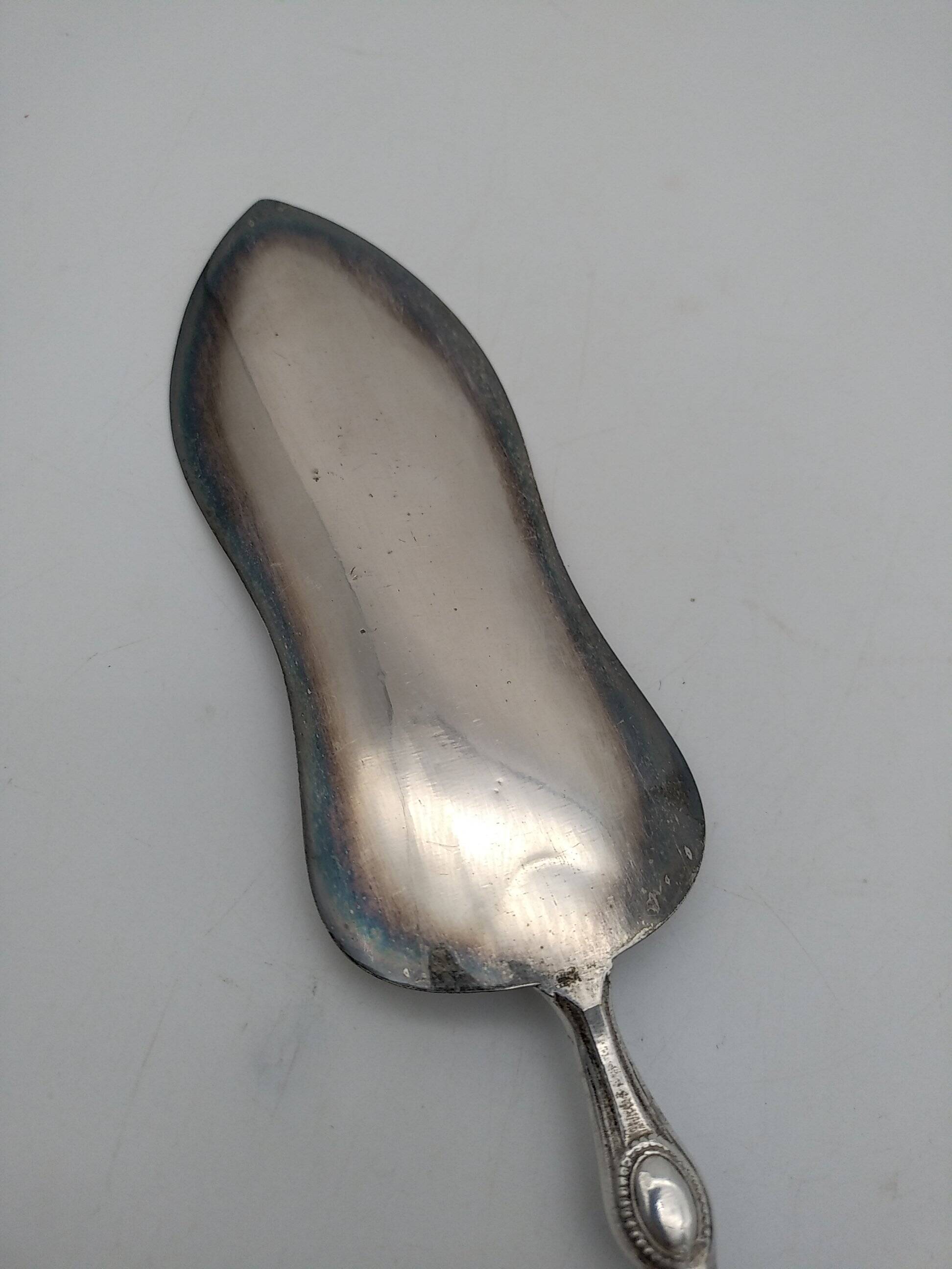 Silver and silver-filled pie server. 19th century.