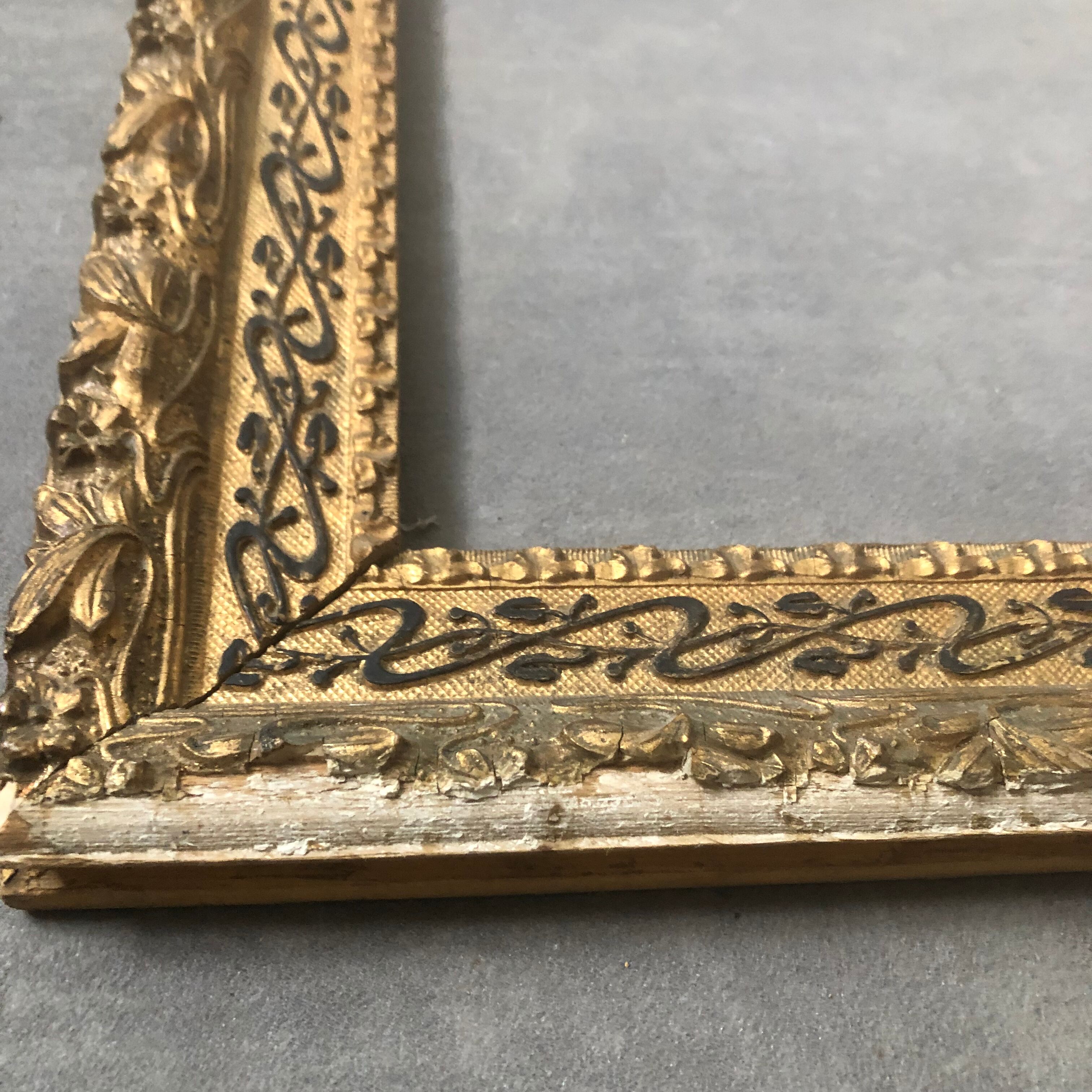Old wooden frame and gilded stucco 50x60
