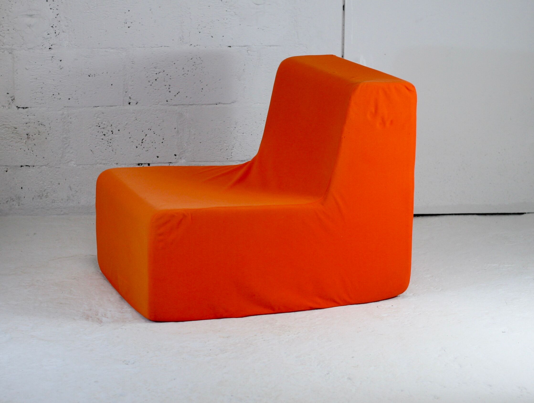 Armchair "space age" foam and orange jersey. Circa 1970