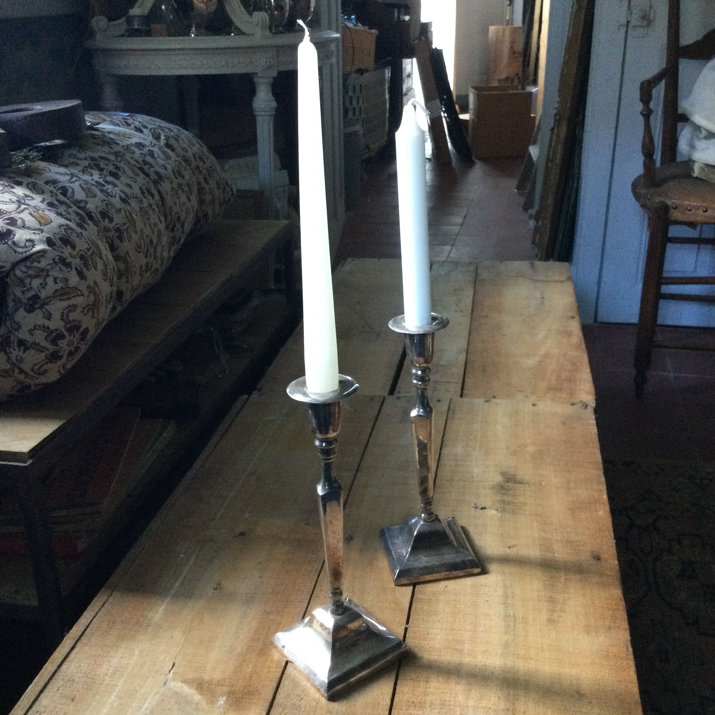 Pair of silver metal candle holders