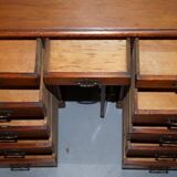 Small Victorian desk in solid walnut with drawers.