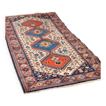 Ancient Asian wool rug, finely knotted, handmade 72 x 33 in.