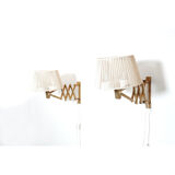 Pair of pine accordion sconces with cotton rope lampshade.