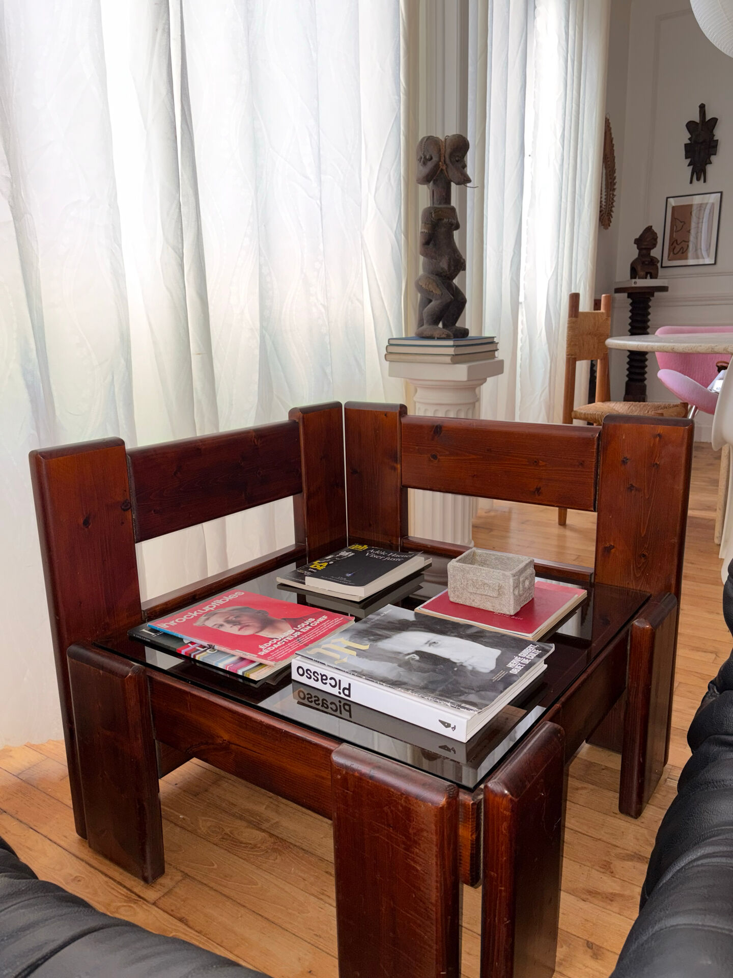 Modernist coffee table in wood and smoked glass.