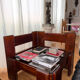 Modernist coffee table in wood and smoked glass.