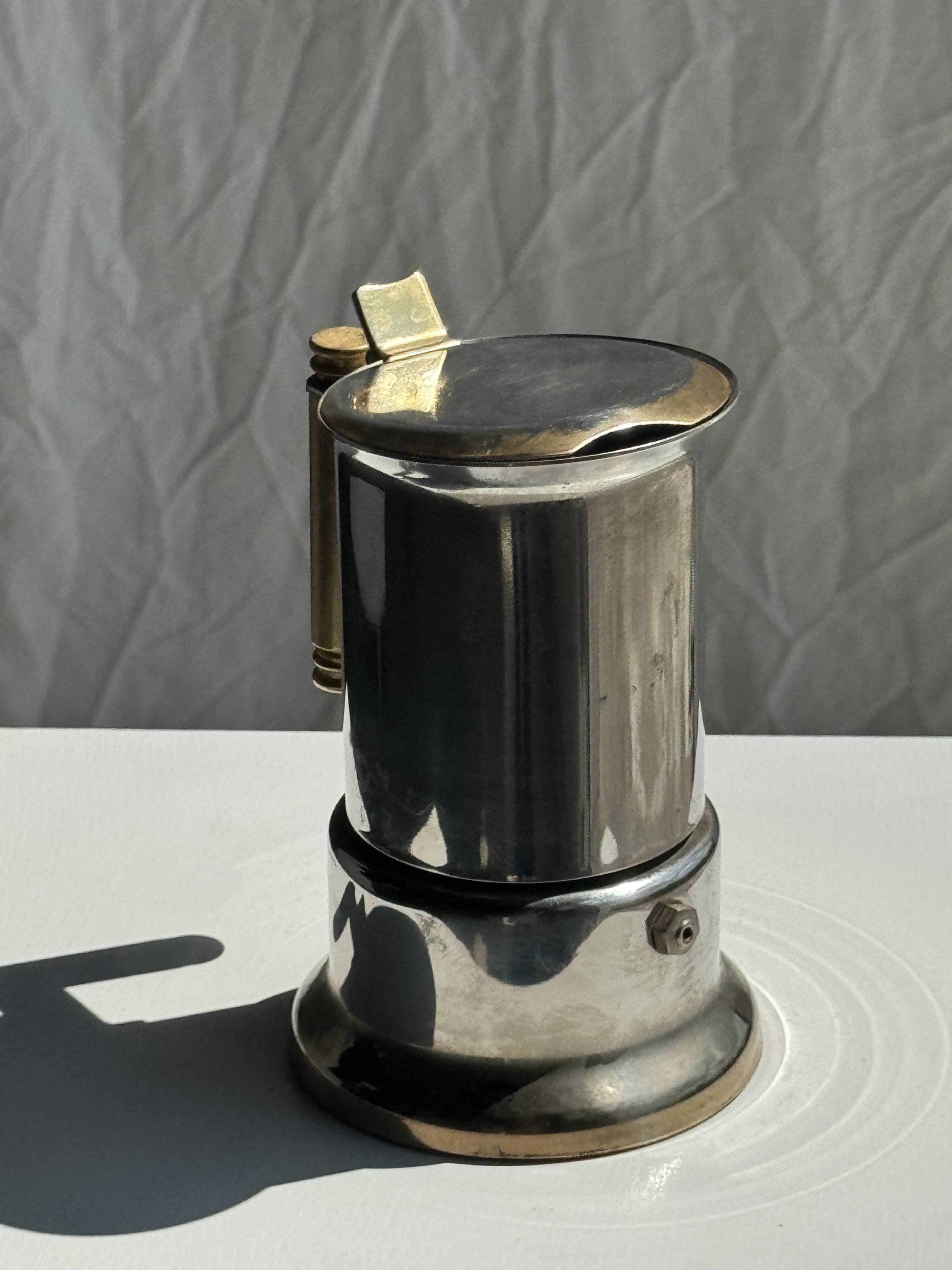 Small silver and gold Italian coffee maker Alpu-F Puppieni in stainless steel