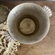 Antique champagne bucket with shell handles.