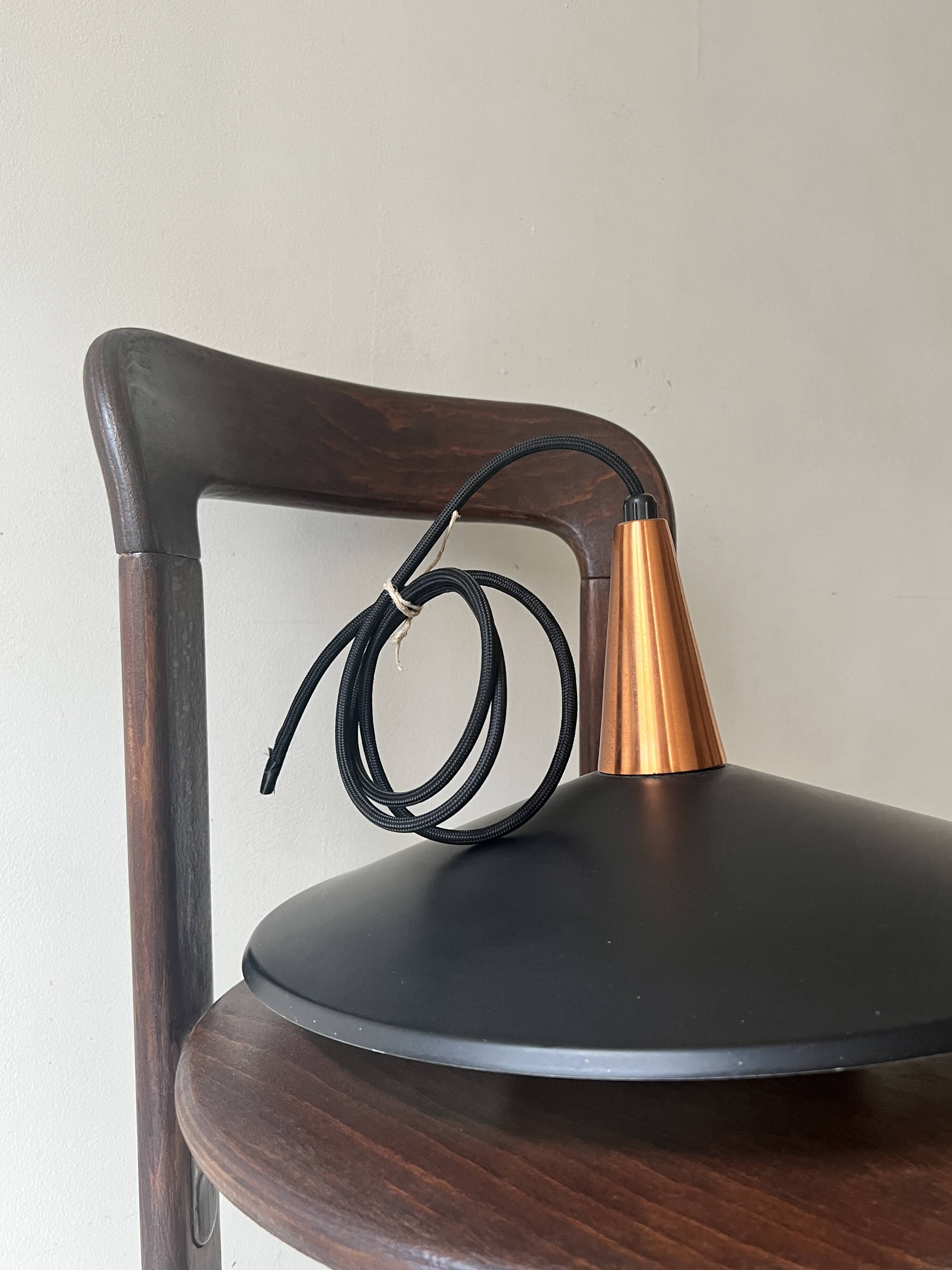 Scandinavian suspension in black metal, copper, and opal glass, 1970s design.