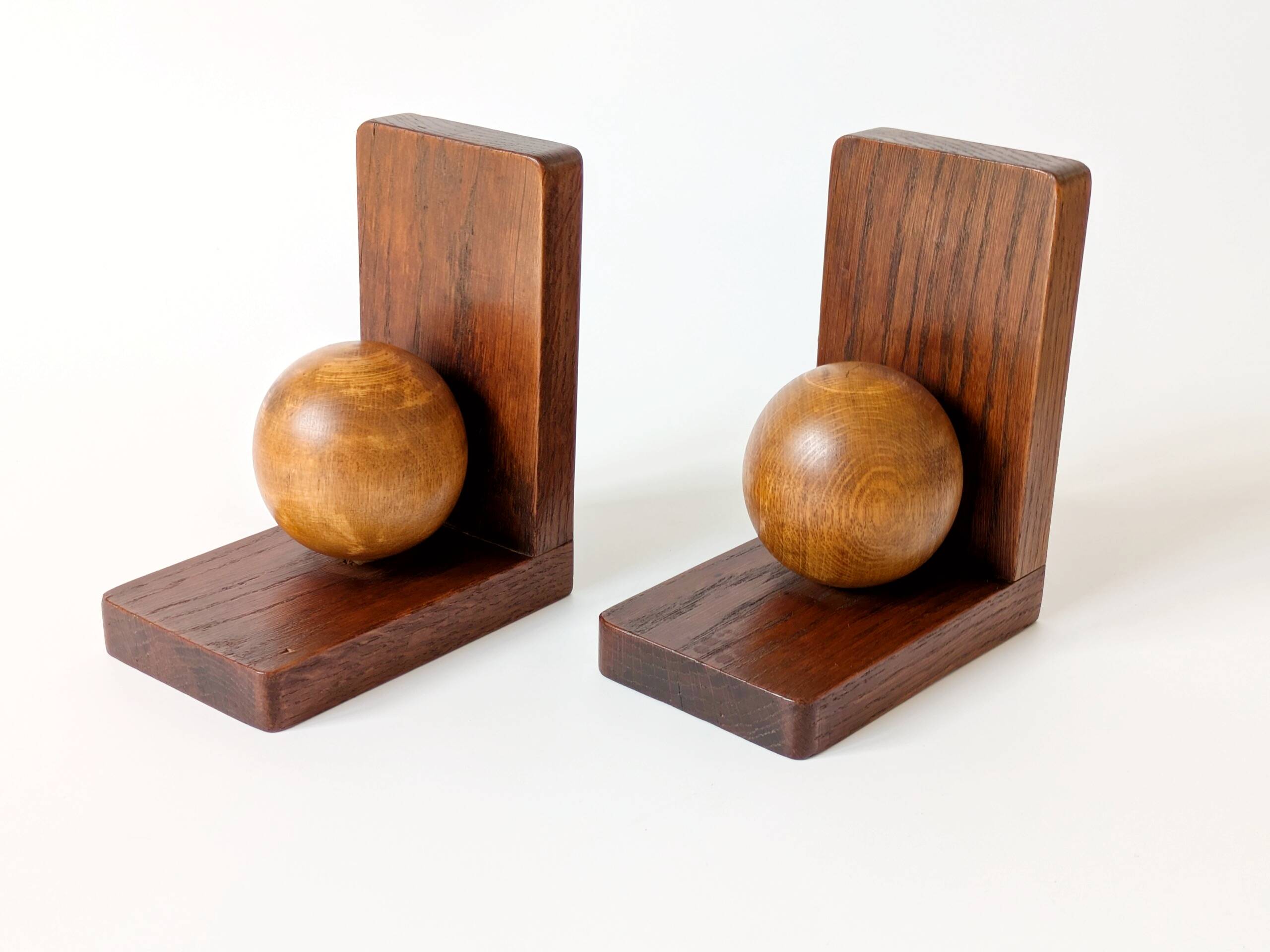 Pair of antique oak ball bookends, Midcentury Art Deco