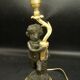 Faun lamp in Clodion style, Louis XVI, early 1900s - gilded and patinated bronze.