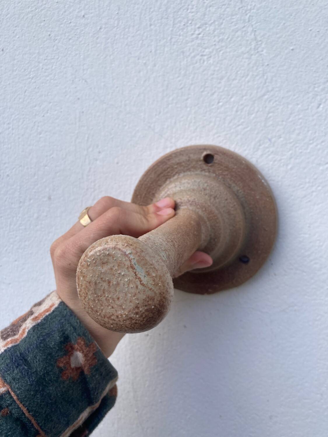 Coat hook sandstone wall light