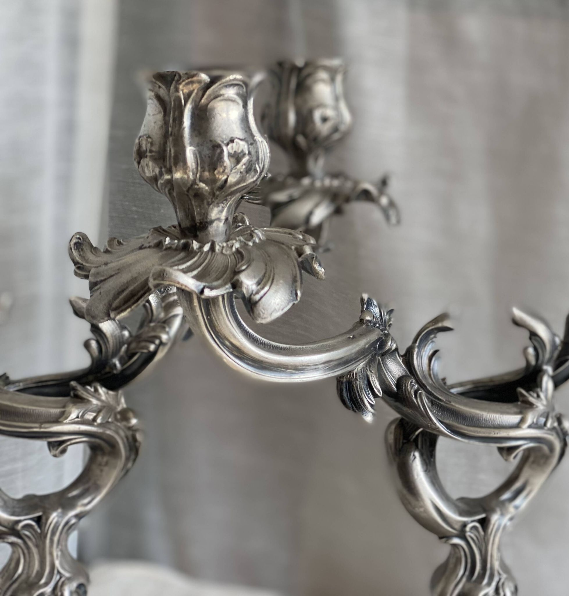 Pair of vintage 1950s silver-plated metal rocaille chandeliers