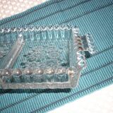 Antique dish in chiseled glass with pearls
