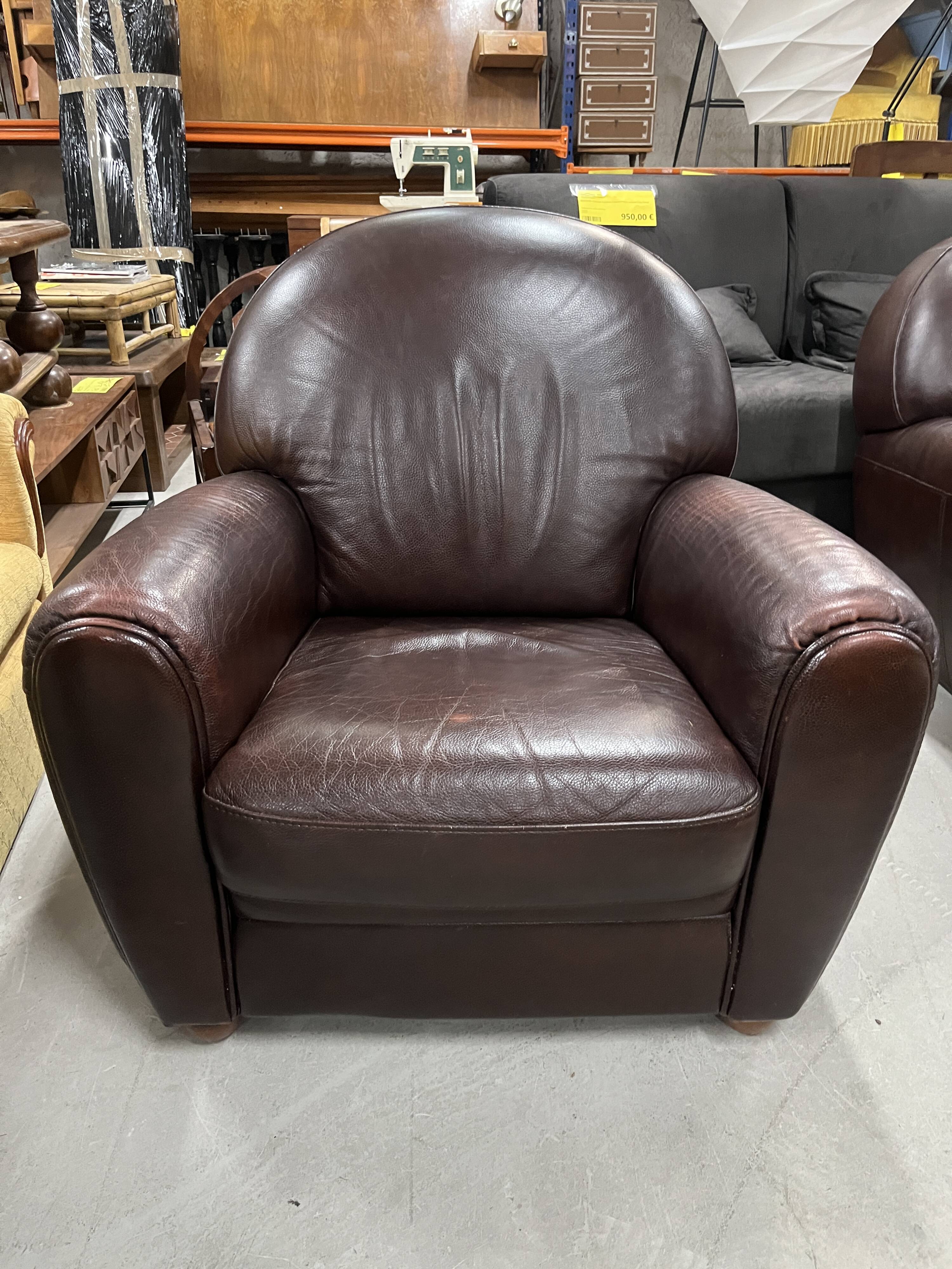 Brown leather club chair