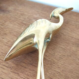 Couple large herons in polished golden brass