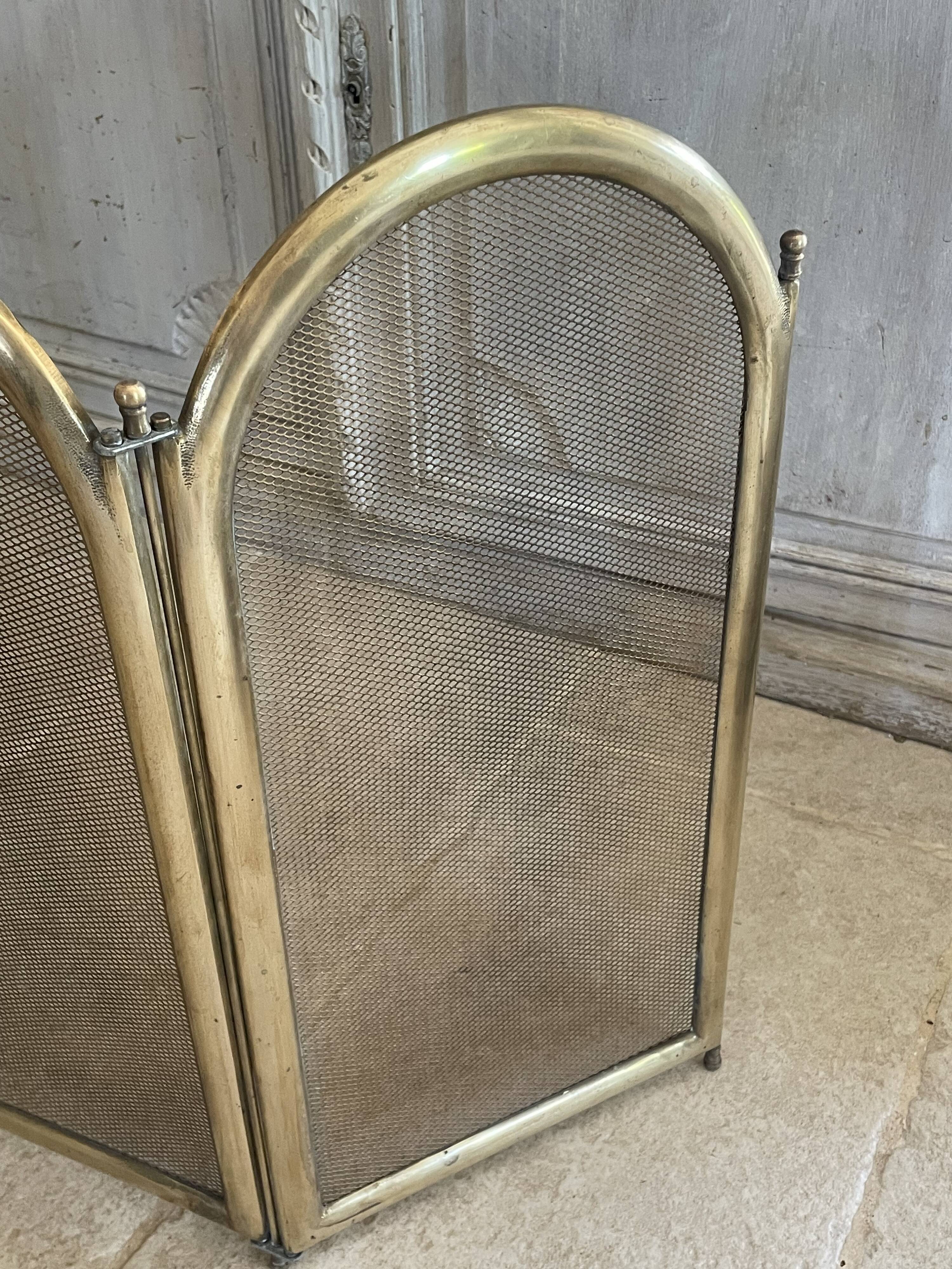 Vintage brass fireplace screen, folding spark guard with 4 panels,