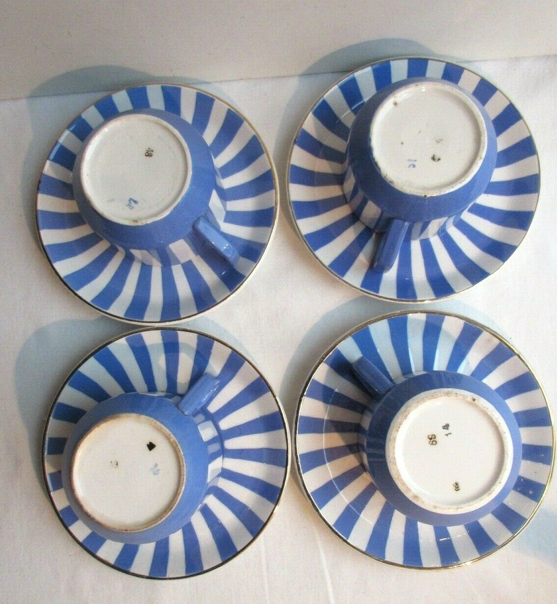 4 coffee cups - 4 saucers signed Sarreguemines model FOX TROTT