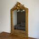 Late 19th century gilded mirror with decorated pediment 125x70cm