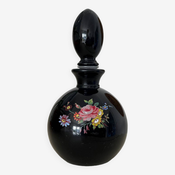 Black glass bottle.