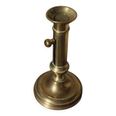 Brass push-button candle holder with decorative torch