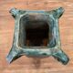 Vintage brutalist ceramic vase with 4 green handles.