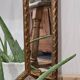 Bevelled mirror with neoclassical parcloses from the 20th century.