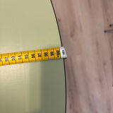 Round extendable folding Formica table with metal legs from the 50s/60s in green.