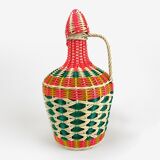Multicolored glass bottle and braided scoubidou