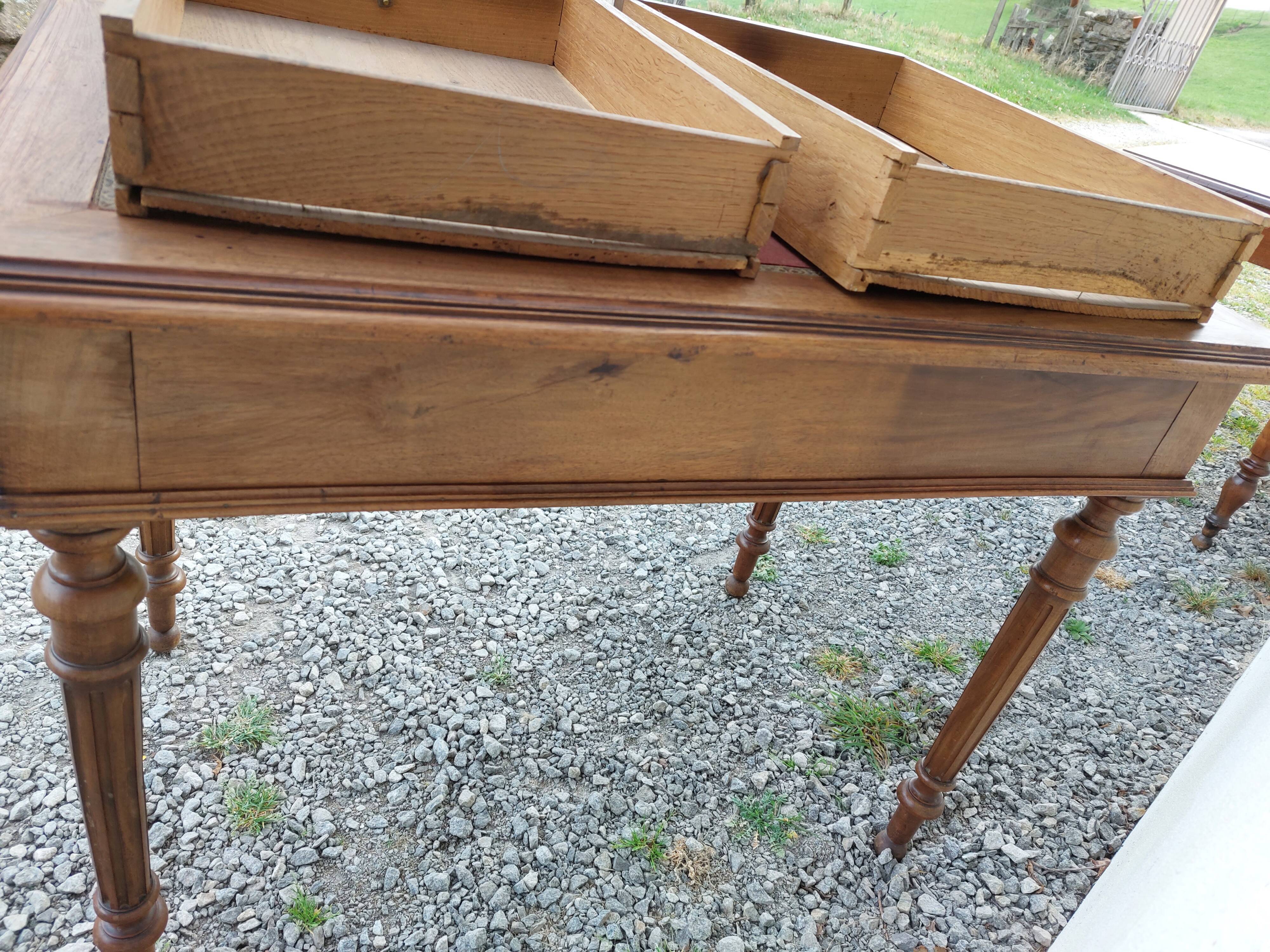 Old wooden desk, red felt top