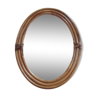 Oval mirror in rattan - 48x37cm